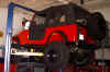jeeponhoist.jpg (68913 bytes)